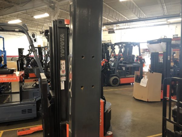 A forklift overhead guard with drill holes