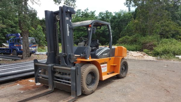 A forklift parked in a yard