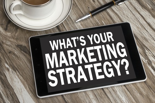 better-marketing-min_500x Tablet computer displaying "What's your marketing strategy?"