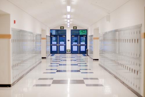 school-hallway-min_500x Empty school hallway with lockers