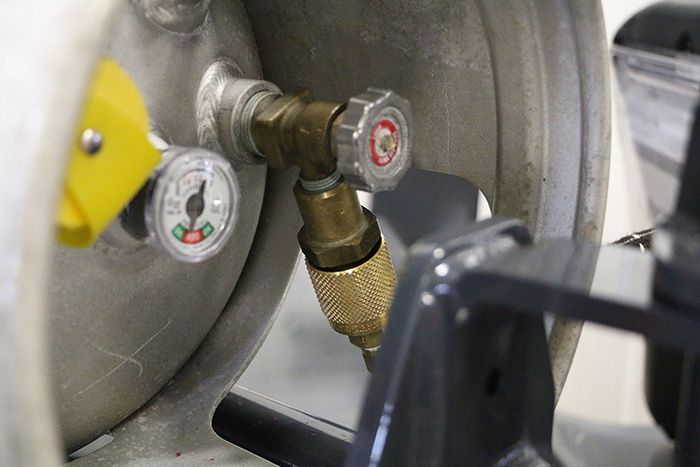 fuel hose on forklift propane tank