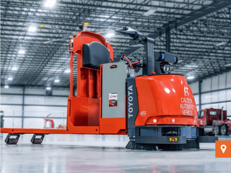 Automated rider pallet jack