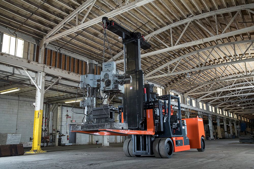 High-capacity cushion forklift with boom attachment