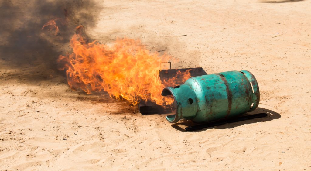 Leaking propane tank on fire