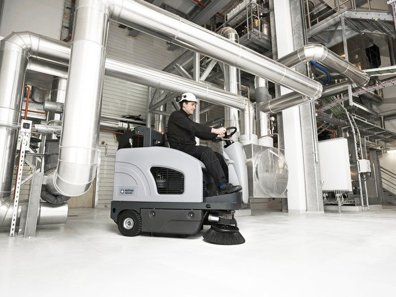 Advance SW4000 sweeper in industrial facility
