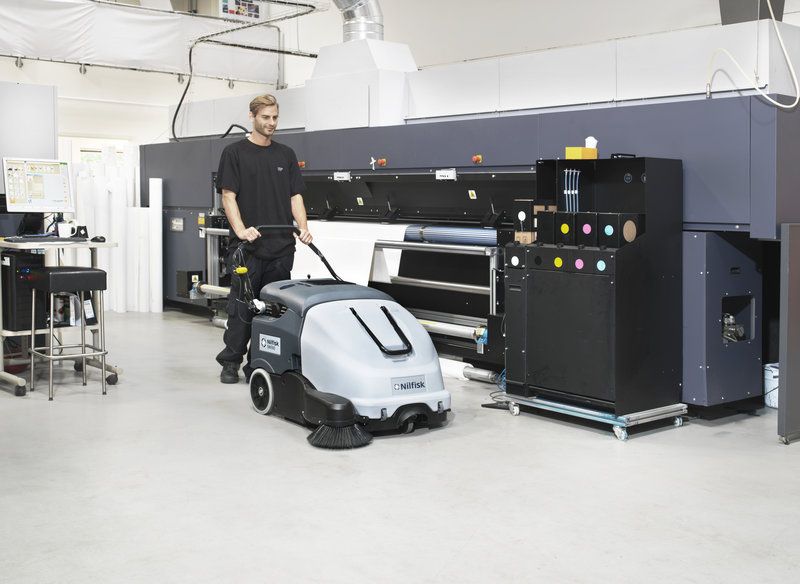 Advance SW900 sweeper on production floor
