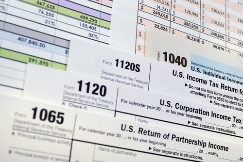 An array of tax documents and spreadsheet
