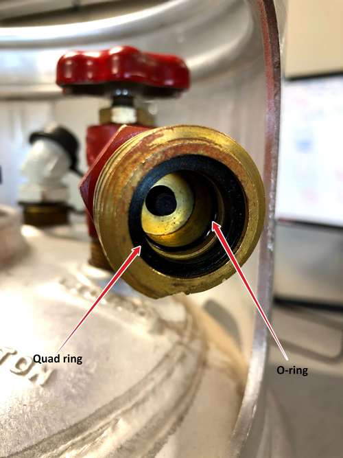 The tank-side coupler with properly-seated o-ring and quad ring