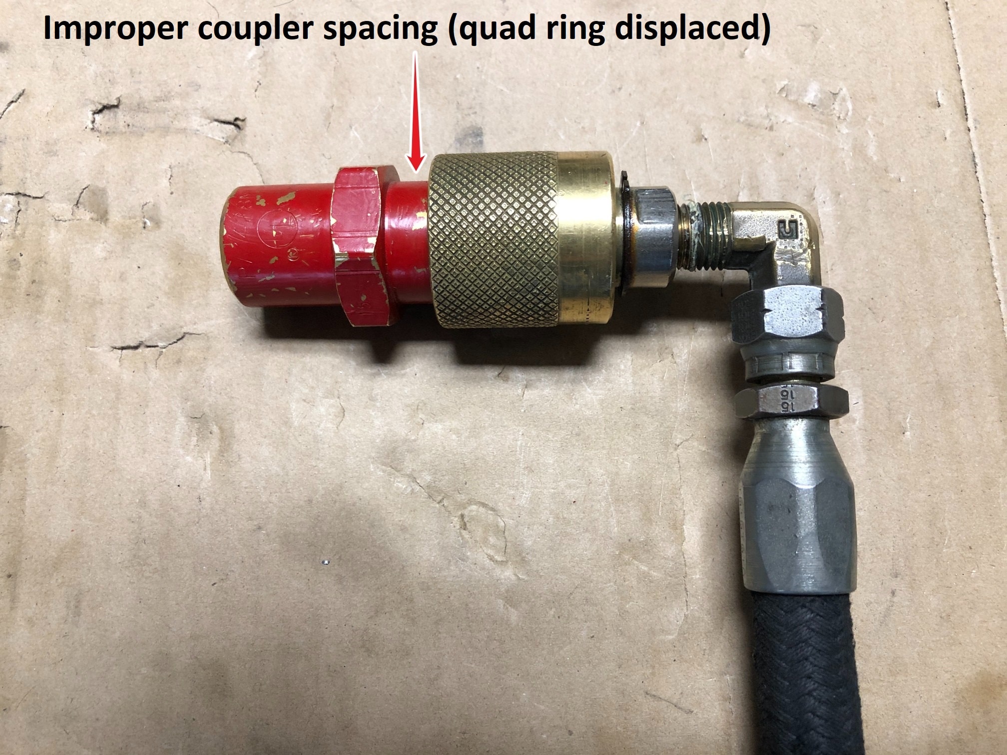 An example of an improperly-connected propane fuel coupler, with too much space between each coupler