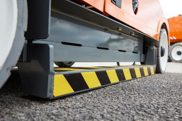 A pothole protector on a Snorkel scissor lift