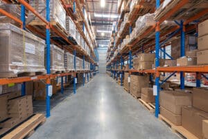 empty-narrow-warehouse-aisle-with-racking-600x400