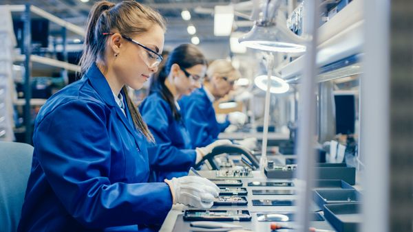 Workers in an assembly line