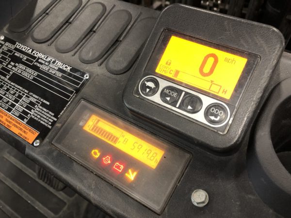 The instrument panel on an internal combustion forklift