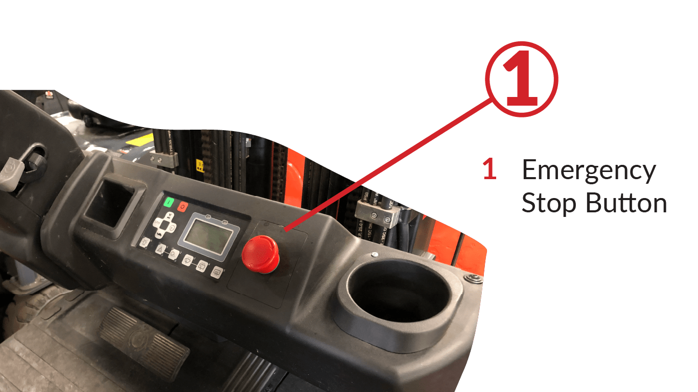An emergency stop button on a sit-down rider electric forklift