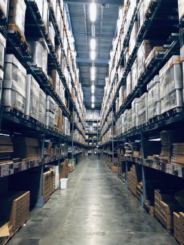 warehouse-aisle Looking down a warehouse aisle with pallet racking on either side