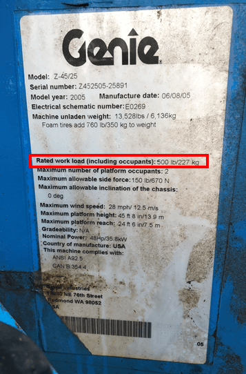 The data tag on a Genie Z-45 boom lift with the rated work load highlighted