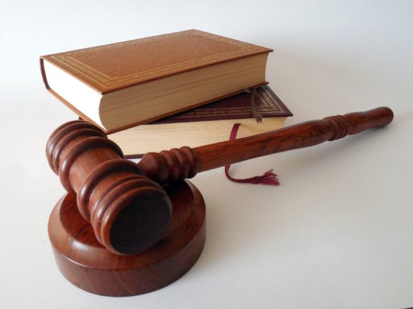 the-law A judge's gavel next to two closed books