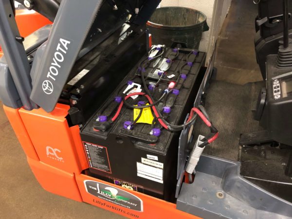 The battery compartment on a Toyota forklift