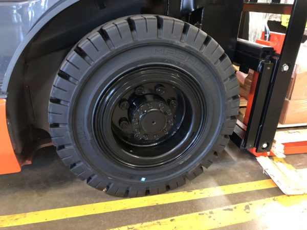 The drive wheel on a Toyota propane forklift