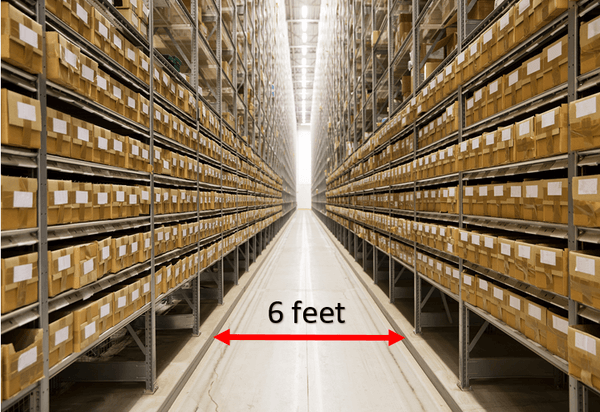 A very narrow warehouse aisle