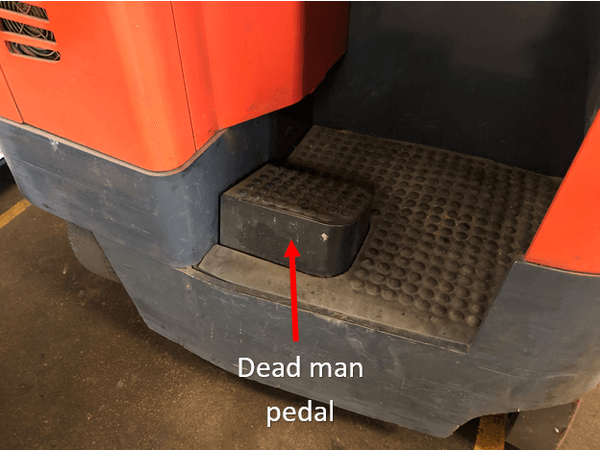 A reach truck deadman pedal