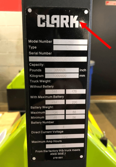 A CLARK electric pallet jack data plate with the manufacturer marked