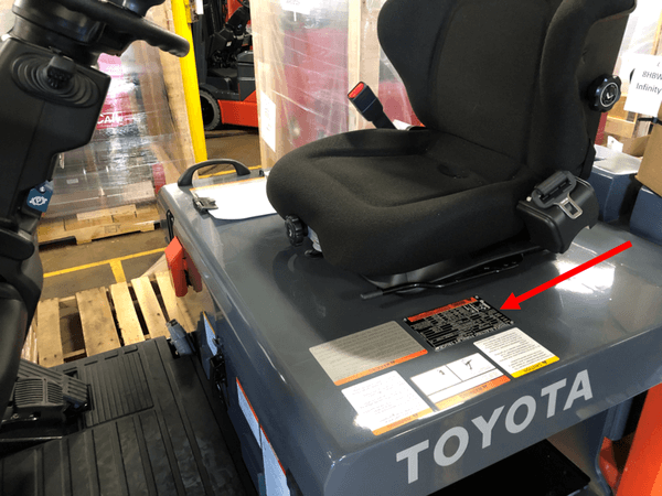 toyota-data-plate-operator-seat-location A forklift hood with the location of the data plate marked