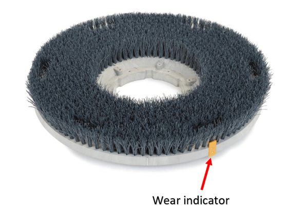 The wear indicator on a disc floor scrubber brush