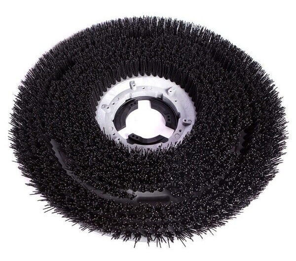 A heavy grit floor scrubber disc brush