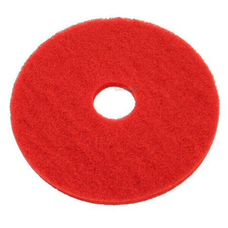 A red floor scrubber pad