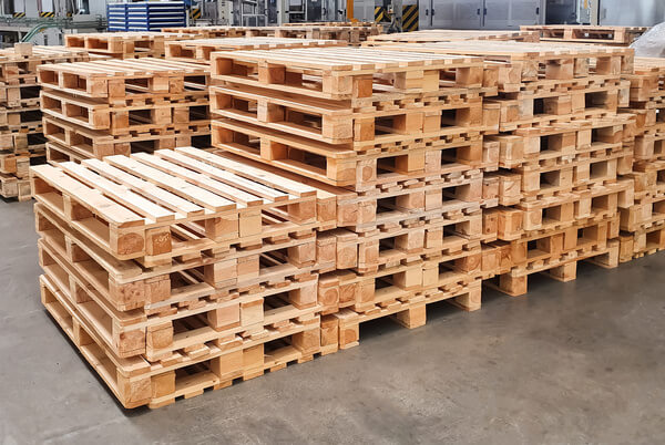 Empty pallets stacked on top of one another