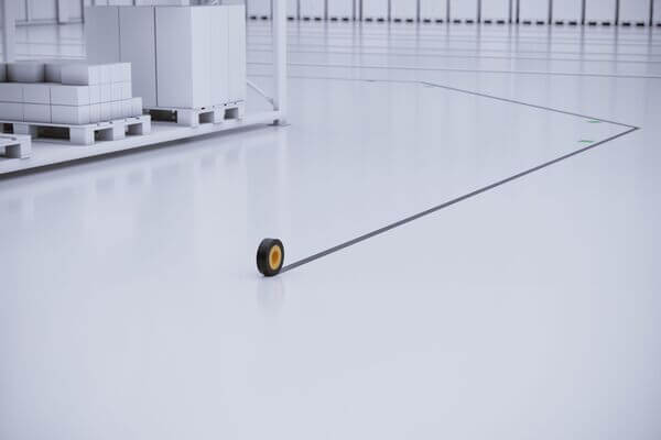 A roll of magnetic tape used to guide an AGV
