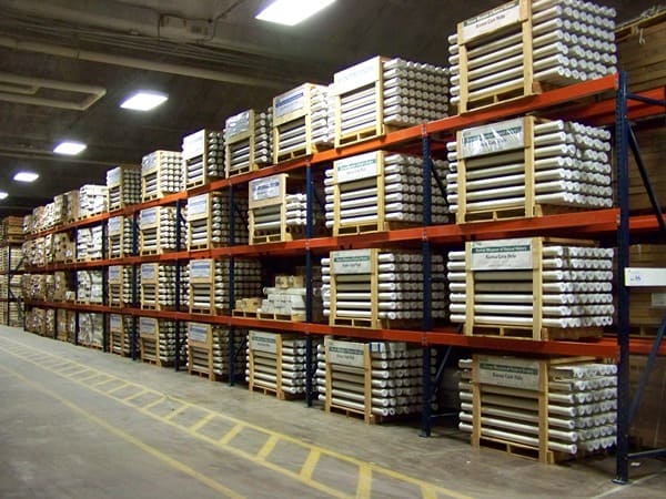 Stacks of core samples held in warehouse shelving