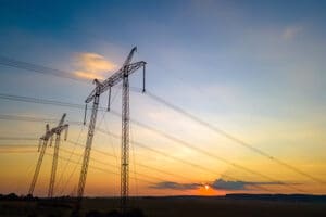 Electrical towers with electrical wires that are artificially charged