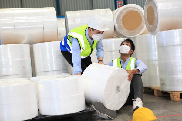 unsecured-object-falling-on-warehouse-worker A warehouse worker injured by a falling roll of material