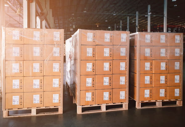 Cardboard boxes stacked in a column-stacking manner