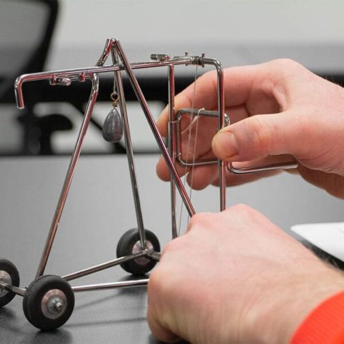 A small model forklift used during operator training to demonstrate the stability triangle principle