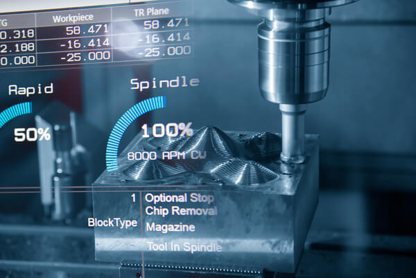 An overlaid text showing technical details on a spinning CNC mill spindle