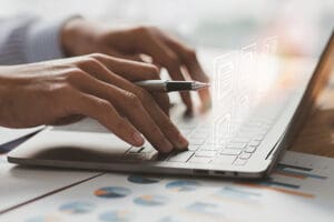 A laptop computer comparing files