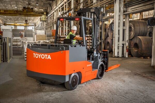 A Toyota high-capacity electric forklift in a steel plant