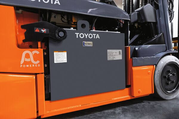 A Toyota 8FBE 3-wheel electric forklift with a lithium-ion battery installed