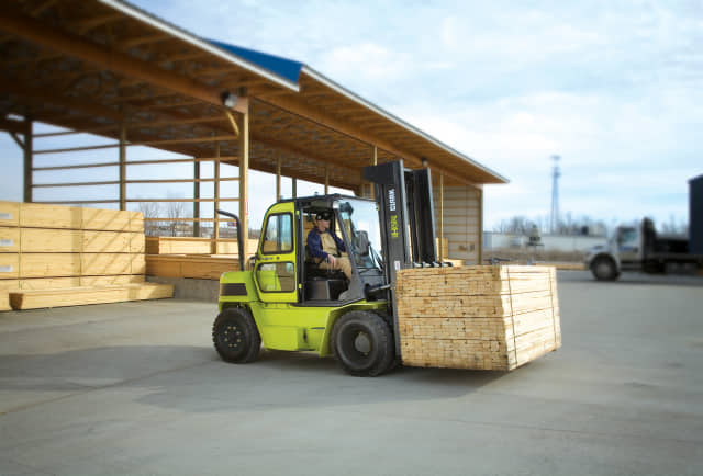 A CLARK C60 internal combustion forklift in lumberyard