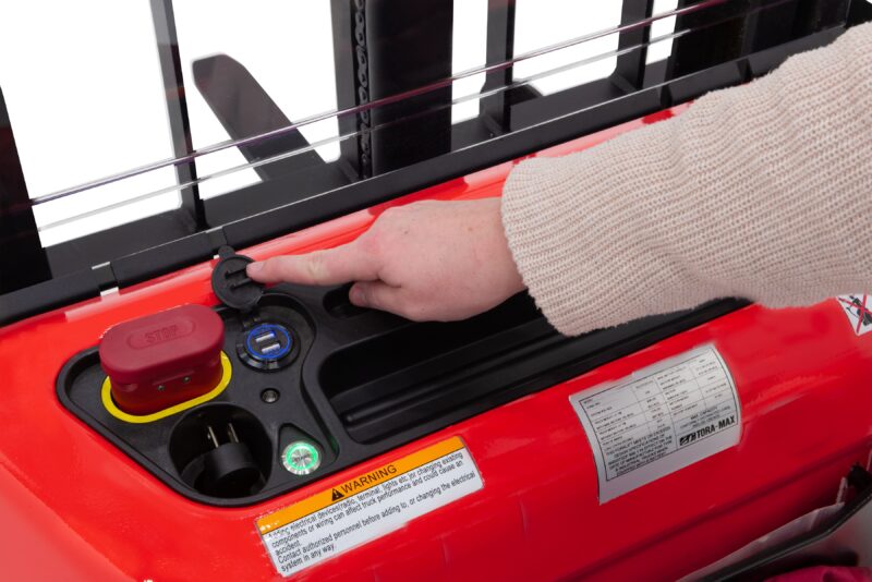 The USB charging ports on a Tora-Max walkie stacker forklift control panel