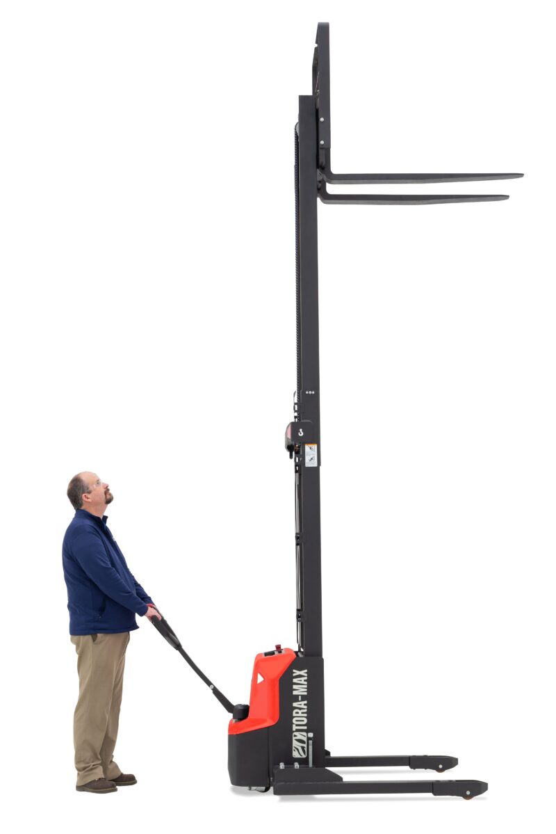 Worker raising the mast on a Tora-Max walkie stacker forklift