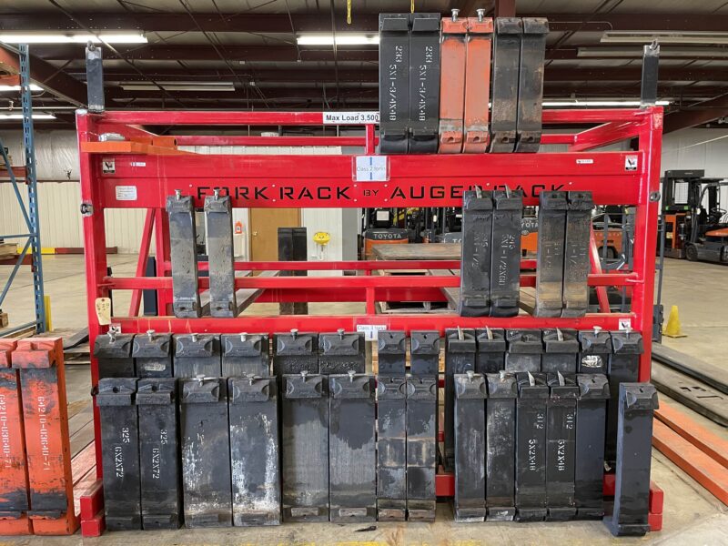 forklift forks ready for rent on a rack