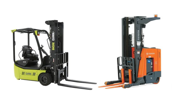 A CLARK sit-down forklift parked next to a Toyota stand-up reach forklift