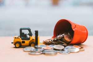 Forklift closeup stacking coins