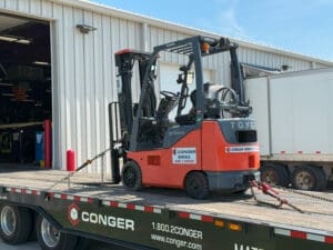 Securing Forklift with Ratchets and Chains